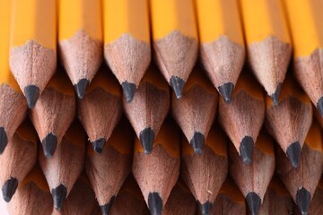 Many graphite pencils as background, closeup view