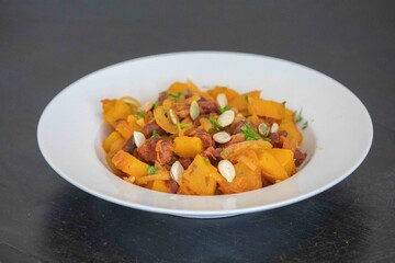 Traditional dried meat with pumpkin known in Brazil as jabá com jirimum