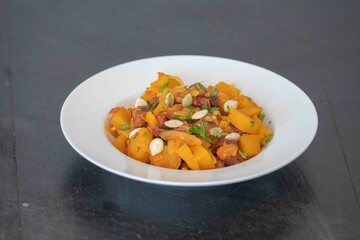Traditional dried meat with pumpkin known in Brazil as jabá com jirimum