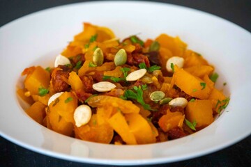 Traditional dried meat with pumpkin known in Brazil as jabá com jirimum