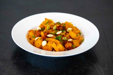 Traditional dried meat with pumpkin known in Brazil as jabá com jirimum