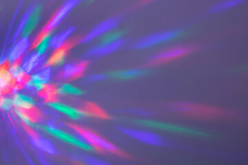 Beautiful multicolored geometric highlights pink blue yellow on a lilac background.
