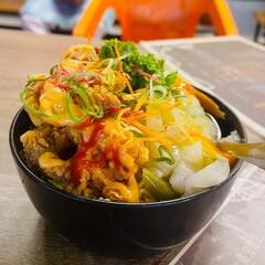 Fried Chicken Rice Bowl with Vegetables and Sauce. chicken and vegetable salad.