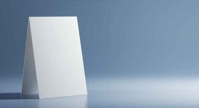 Blank card standing upright on a smooth surface against a soft blue gradient background, symbolizing communication and organization