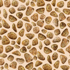Natural river stones arranged in an organic pattern on a light background for creative design purposes