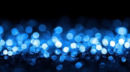 An artistic display of shining blue circular light elements