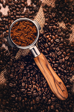 Portafilter with Ground Coffee and Roasted Beans