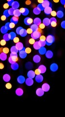Abstract background featuring vibrant colorful bokeh effect lights illuminated softly