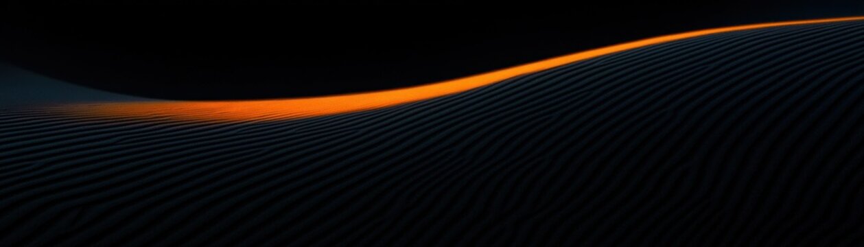 The dark textured surface with an illuminated orange wave
