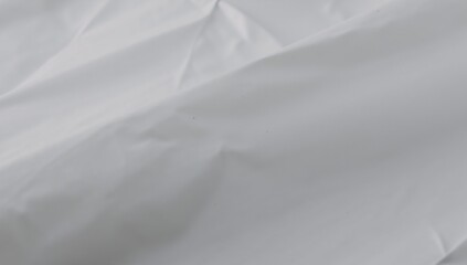 Fototapeta premium Close-up view of a weathered white trash bag texture