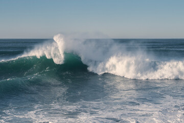 Large waves crash during a powerful surge at the Columbia River Bar at the Oregon Coast