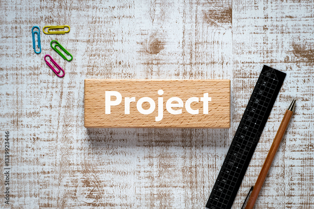 Poster there is notebook with the word project. it is as an eye-catching image.