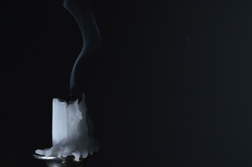 Extinguished Candle with Rising Smoke on Black Background – Moody and Dramatic Still Life...