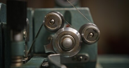 An InDepth and Detailed View of a Vintage Sewing Machines Intricate Mechanism and Design