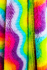 Colorful soft plush fabric with wavy rainbow pattern
