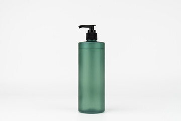 Green Cosmetic Bottle with Black Pump on White Background