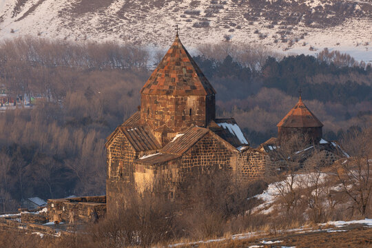 Sevanavank Monastery on the Sevan Peninsula during a cold early winter morning, at sunrise, overlooking the vast Lake Sevan. One of Armenia&rsquo;s most popular travel and cultural destinations
