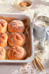Healthy and tasty crispy kaiser buns baked in bakery.
