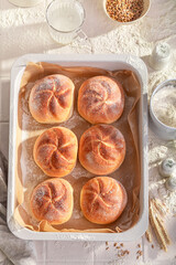 Healthy and tasty crispy kaiser buns baked in bakehouse.