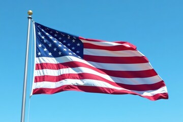 Fototapeta premium Crisp, clear sky, a bold American flag proudly unfurls in gentle breeze , waving, blue