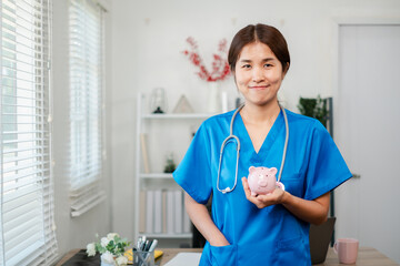 Cheerful nurse in blue scrubs with stethoscope holding a piggy bank, symbolizing healthcare savings...