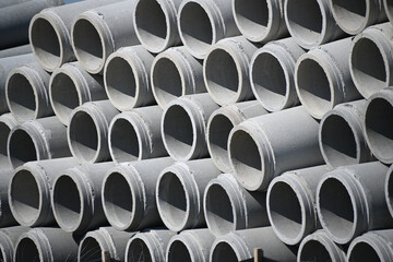Reinforced precast concrete pipe pile designs stacked in a pile