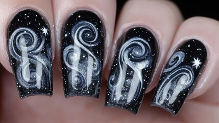 Cosmic nail art swirls on black nails