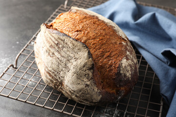 Freshly baked bread on grey table, closeup