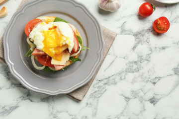 Flat lay composition with tasty brunch on white marble table. Space for text