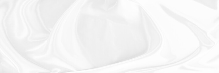 Obraz premium White gray satin texture that is white silver fabric silk panorama background with beautiful soft blur pattern natural.