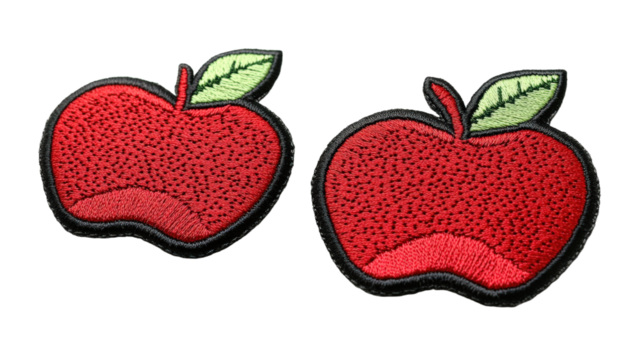 A red apple with green leaves embroidered on it
