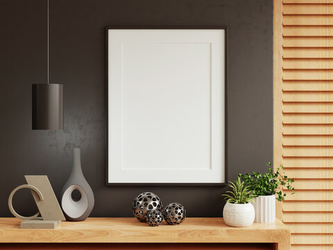 Mockup frame on cabinet in living room interior on empty dark wall background- 3D rendering