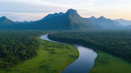 Mountain range landscapes idea. Breathtaking aerial view of lush green valley and winding river with majestic mountains.