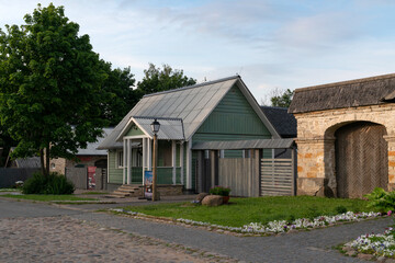 View of historical merchant buildings of estates on the main street of Izborsk Pechorskaya Street...