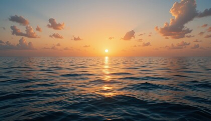 Obraz premium Beautiful Sunset Over Calm Ocean Waves with Colorful Sky Reflections