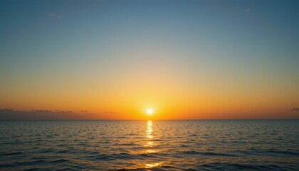 Obraz premium Serene Sunset Over Calm Ocean Waves Reflecting Vibrant Colors