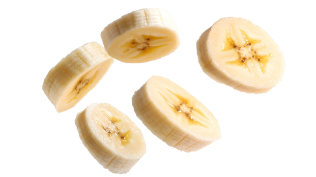 Fresh cleanly cut banana slices arranged in a minimalistic composition against a pure white background creating a simple and visually striking image