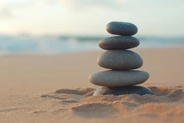 A serene image of stacked zen stones on a calming sand background, representing tranquility, mindfulness, and balance.