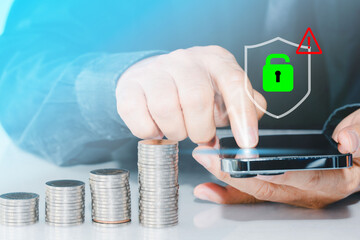 Businessman  with warning notification alert alarm and spam message icon on mobile phone.cyber...