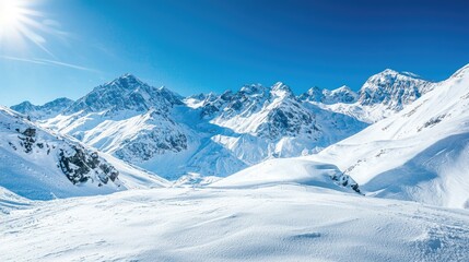 Snow-covered mountains under a clear blue sky.