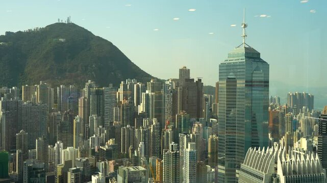 Hong Kong - January 9, 2025: Hong Kong skyline as seen from the Hong Kong Monetary Authority Museum. High quality 4K footage