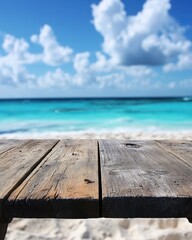 Fototapeta premium Serene tropical beach scene with weathered wooden table turquoise water and azure sky creating a tranquil and inviting summer vacation backdrop