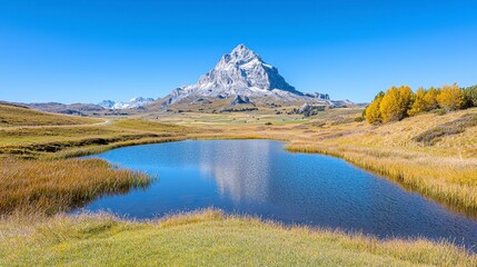 Fototapeta premium Snow Capped Mountain Reflecting in a Calm Autumn Pond