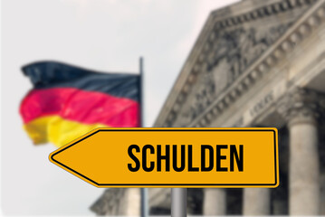 Flagge von Deutschland, Reichstag und Schild Schulden