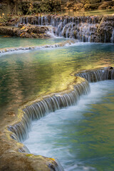 Kuang Si Falls, Luang Prabang, Laos. Turquoise waterfalls, natural landscape, dry season