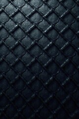 Obraz premium Dark metallic surface with intricate carbon fiber weave, industrial texture, abstract, modern