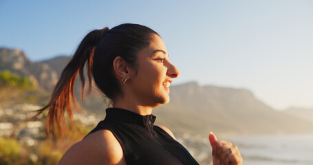 Woman, fitness or running with sunset on mountain for workout, exercise or cardio training....