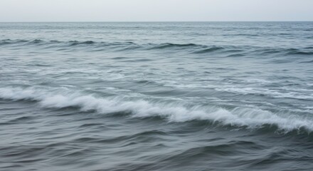 Fototapeta premium Serene Ocean Waves Crashing on Shoreline Coastal Seascape Blue Water Texture