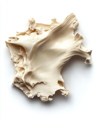 Fototapeta premium Abstract creamy sculpture on white background showcasing smooth texture and intricate patterns in bright studio light