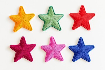 Colorful embroidered star patches on white background (1)